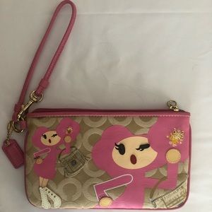 Coach wristlet, Pink. Non smoking home. Great condition.